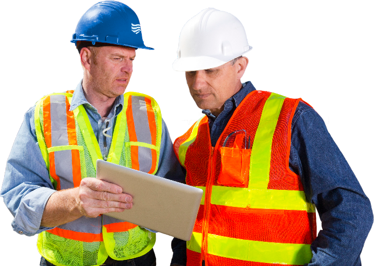 Two construction workers reviewing a stormwater inspection on a tablet